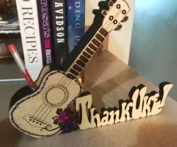 Guitar pen holder