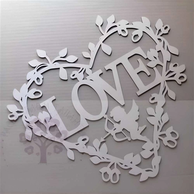 Cutouts love heart floral design with angel