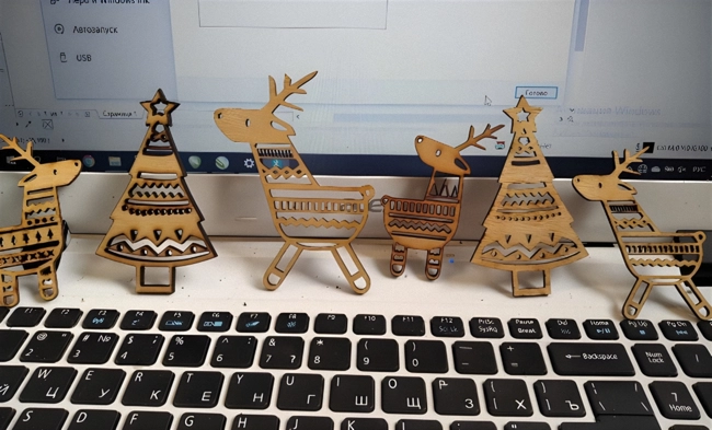 Deer with christmas tree wooden decorations