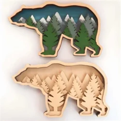 Layered bear decor with mountains and trees