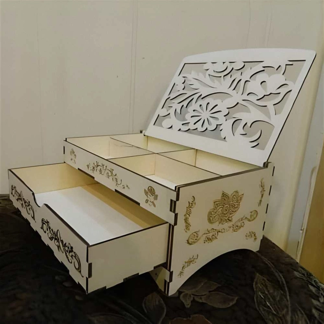 Multi compartment jewelry box with floral cutout lid