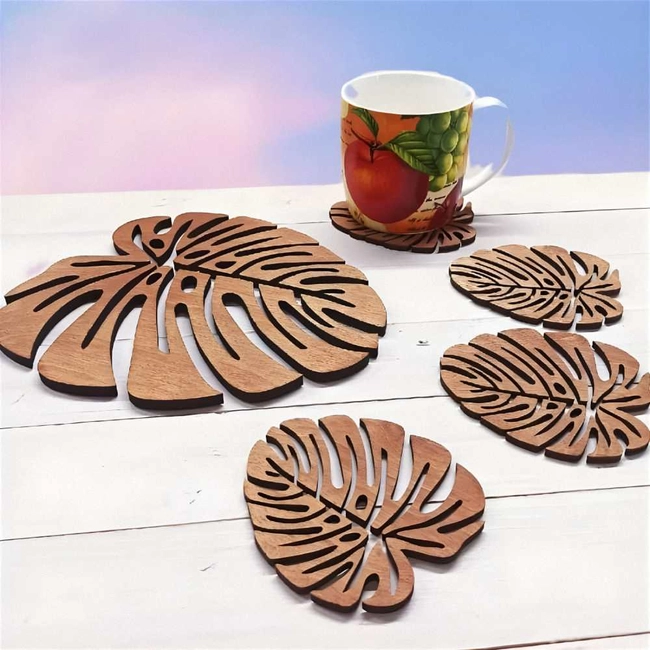 Wood coaster with monstera leaf design for coffee mugs