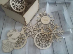 Wooden box with snowflake toys