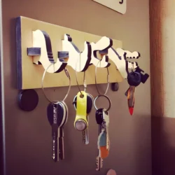 Wall mounted key holder with animal