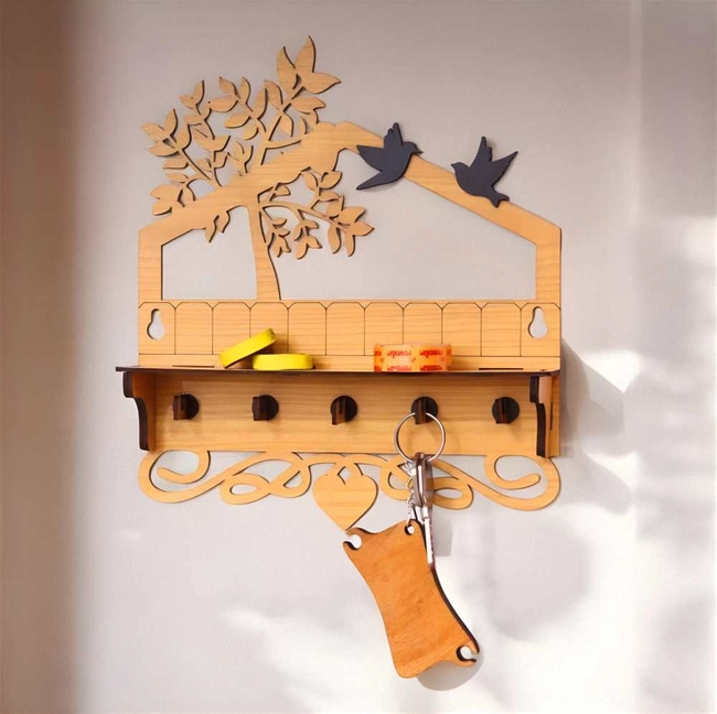 Wall mounted key holder with tree