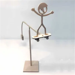 Wooden balancing skateboard guy