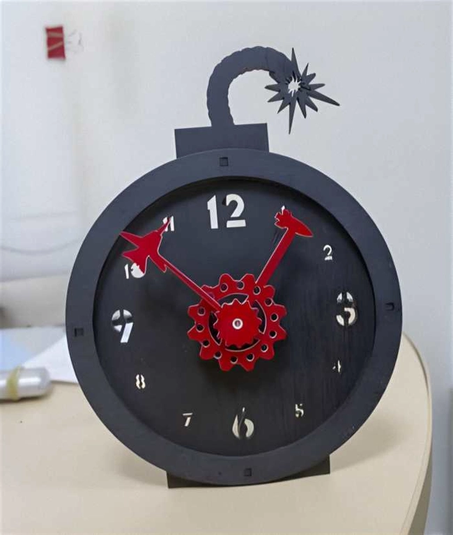 Wooden burst bomb table clock